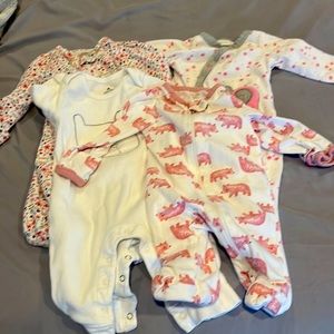 Lot of 4 piece footed one piece baby girl newborn great condition